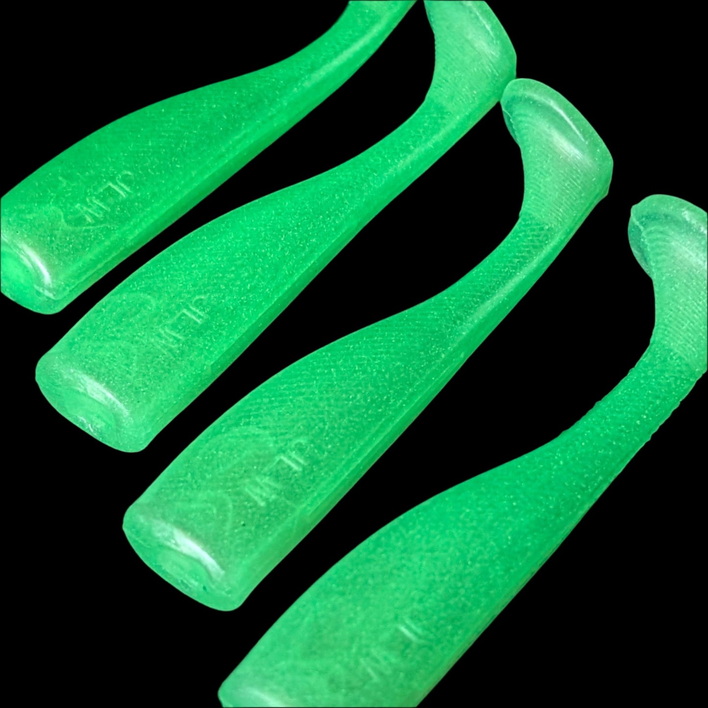 4 inch paddle tail swim bait in Bone Glo  – Jonah Lure Works Nine Lives Soft Plastic Swim Bait. Fresh and salt water rated.